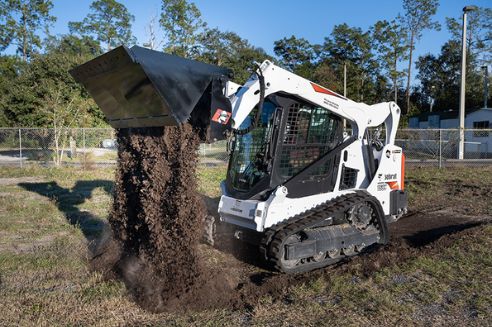 The Four Functions of a 4 in 1 Skid Steer Bucket Explained