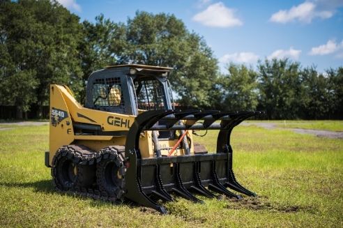 4 Jobs You Can Do With a Skid Steer Log Grapple Bucket