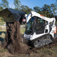 The Four Functions of a 4 in 1 Skid Steer Bucket Explained