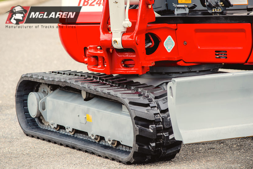 Mini excavator with McLaren rubber tracks 