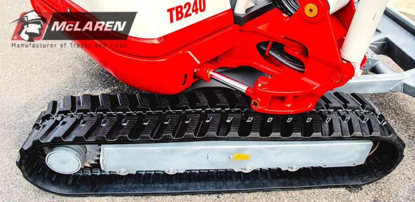 Mini excavator with McLaren rubber tracks 