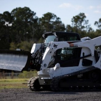 Why a Skid Steer Dozer Blade Is a Must-Have Attachment