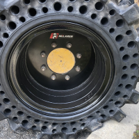 Press-On vs. Bonded Wheel Solid Skid Steer Tires